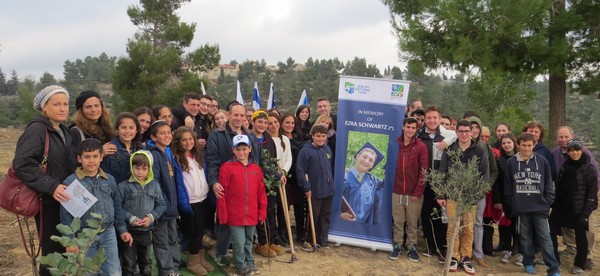 Famiily and friends of Ezra Schwartz at the tree planting ceremony in his memory, in Aminadav Forest. Photo: Yoav Devir