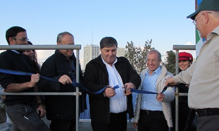 KKL-JNF World Chairman Danny Atar cuts the ribbon, inaugurating the solar panels. Photo: Tania Susskind