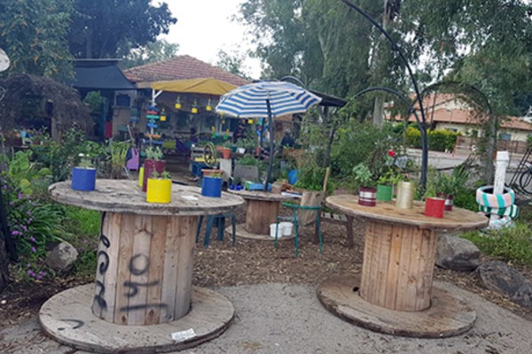 Picnic tables made from discarded IEC cable spools. (Photo: Shimona Sebag Deri)