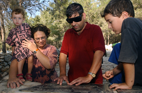 Guidance sign in braille writing for the visually-impaired. Photograph: Flash 90